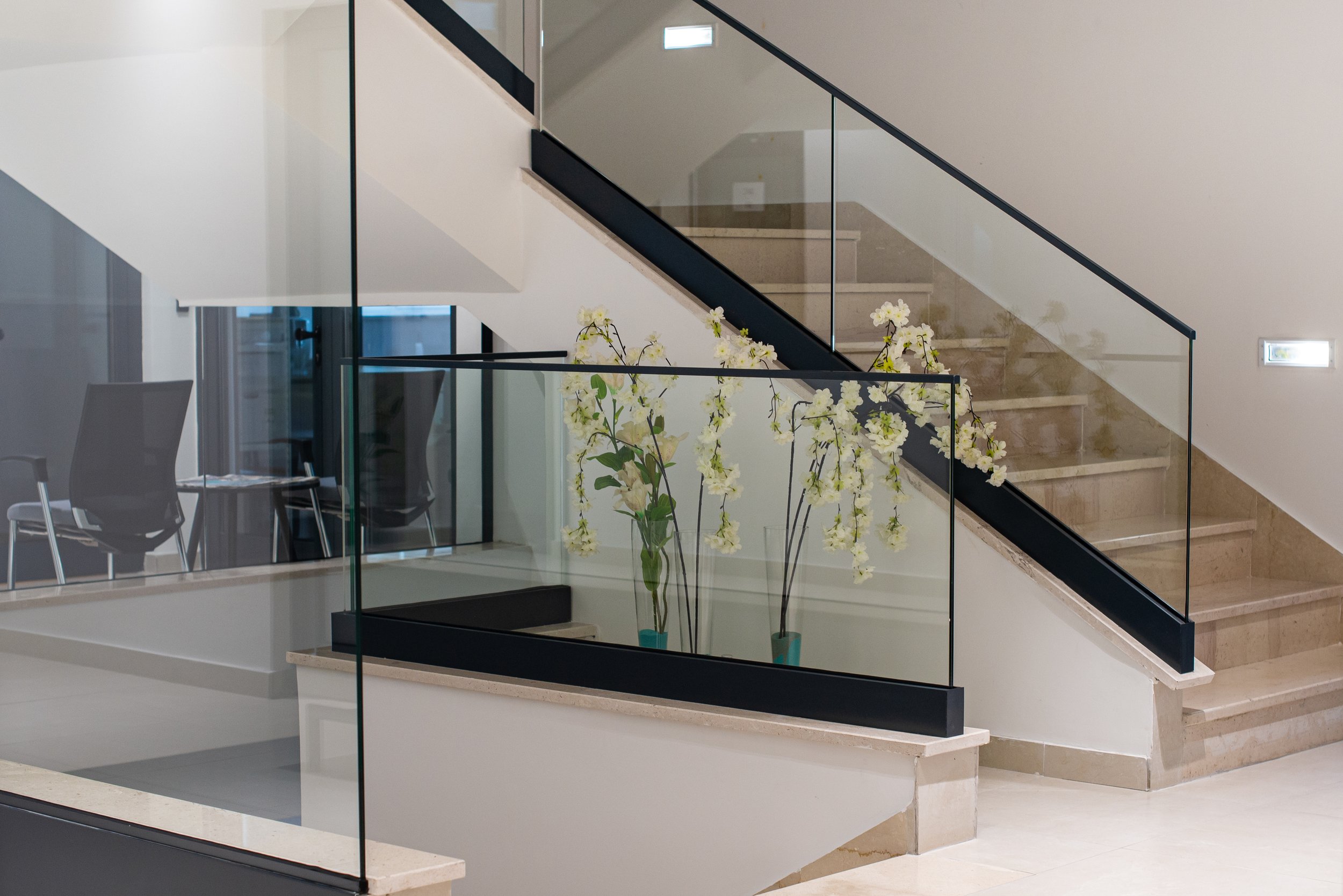 DK Railings- white interior with glass fence and stairs